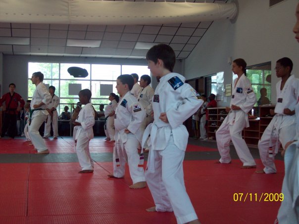 Taylor and Justin white belts.